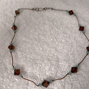Amber and aqua glass bead necklace on silk cord